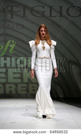 ZAGREB, CROATIA - MAY 09: Fashion model wearing clothes designed by Avaro Figlio on the Zagreb Fashion Week on May 09, 2014 in Zagreb, Croatia.