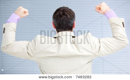 Businessman Punching The Air In Celebration