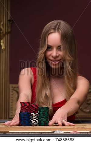 Handsome man and beautiful woman in casino