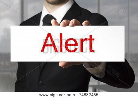 Businessman Holding Sign Alert