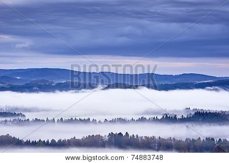 Hilly Landscape With Fog