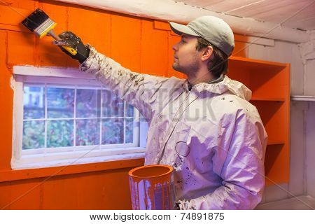 Man dyer in wooden interior.