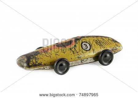 old toy car on white background