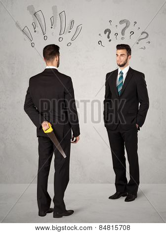 Ruthless businessman handshake with drawn exclamation and question marks around them head