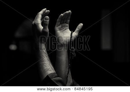 Hands Holding A Muslim Rosary