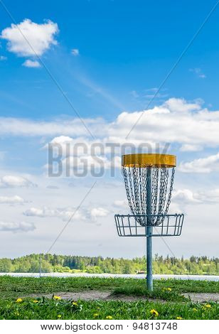 Disc Golf Basket On The Grass