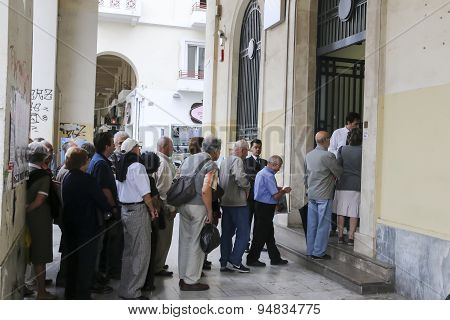 Pensioners Queue Outside A National Bank Branch As Banks Only Opened For The Retired To Allow Them T