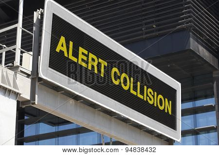 Alert Collision Signpost In The City With Building Facade Background