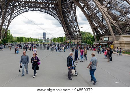 Tourists Near The Eiffel Tower, Main Attraction Of Paris