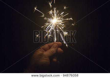 Sparkler In Hand During Celebration