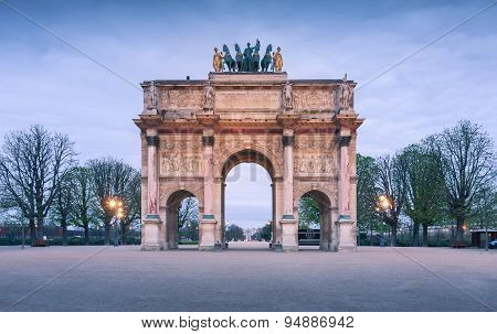 The Arc de Triomphe du Carrousel as the main entrance to the Louvre Museum.