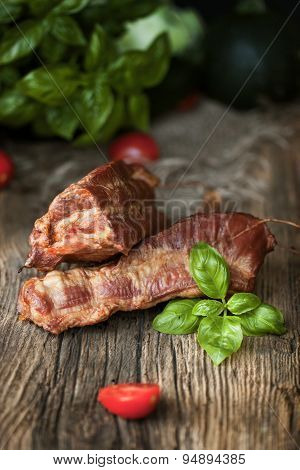 Smoked bacon on wooden table