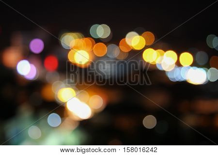 Abstract blurred bokeh in city colorfu beautiful in night top view with copy space