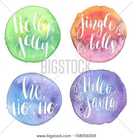 Greeting Christmas cards with hand-drawn typography lettering phrases: Holly Jolly, HoHoHo,Hello santa,Jingle bells on watercolor painted circle backgrounds. Holiday banner, sticker, or poster design.