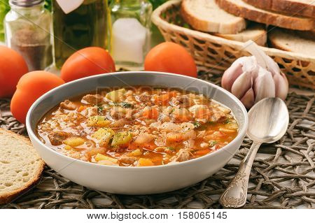 Nutrient soup with meat, rice and vegetables - mastava (uzbek kitchen).
