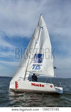 Kiev, Ukraine - September 30, 2016: Sailing yacht training day. Day before race on the Kiev reservoir or pond