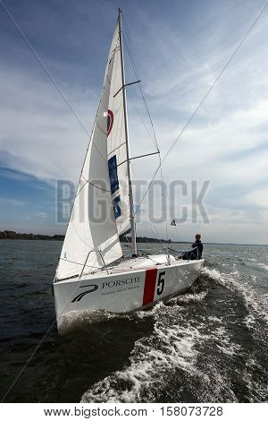 Kiev, Ukraine - September 30, 2016: Sailing yacht training day. Day before race on the Kiev reservoir or pond