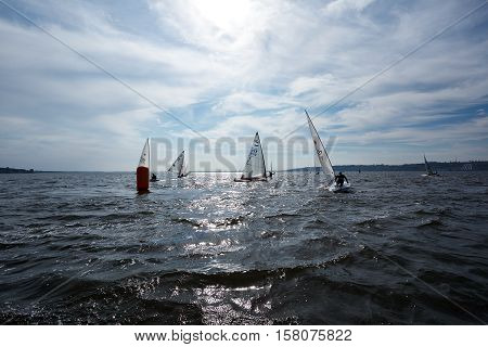 Kiev, Ukraine - September 30, 2016: Sailing yacht training day. Day before race on the Kiev reservoir or pond