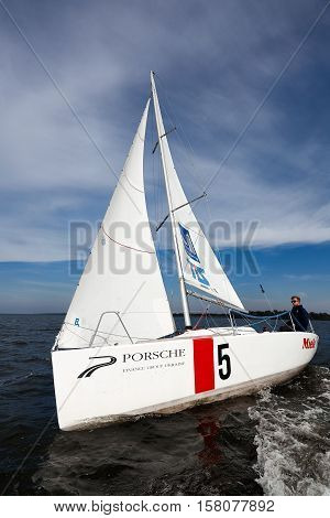 Kiev, Ukraine - September 30, 2016: Sailing yacht training day. Day before race on the Kiev reservoir or pond