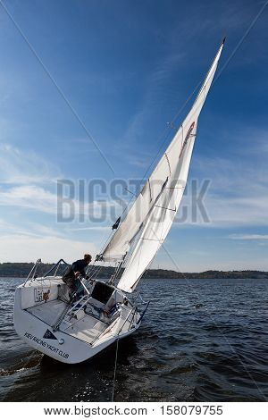 Kiev, Ukraine - September 30, 2016: Sailing yacht training day. Day before race on the Kiev reservoir or pond