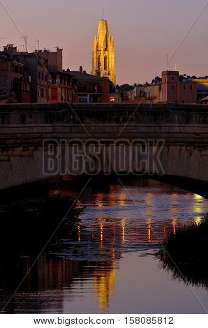 night view of the Sant Feliu Church and Onyar River in Girona CataloniaSpain