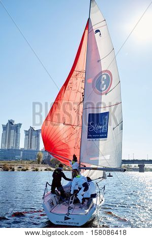 Kiev, Ukraine - September 30, 2016: Sailing yacht training day. Day before race on the Kiev reservoir or pond