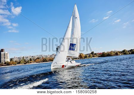 Kiev, Ukraine - September 30, 2016: Sailing yacht training day. Day before race on the Kiev reservoir or pond