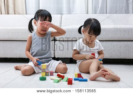 Asian Chinese Little Sisters Struggle For Blocks
