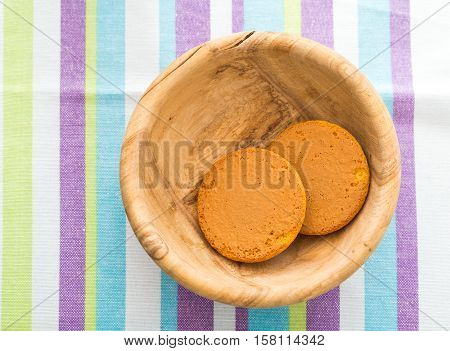 Biscuits Cakes In Wooden Bowl On Table