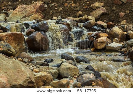 Stream from the melting of glaciers on the active volcano Mutnovsky.