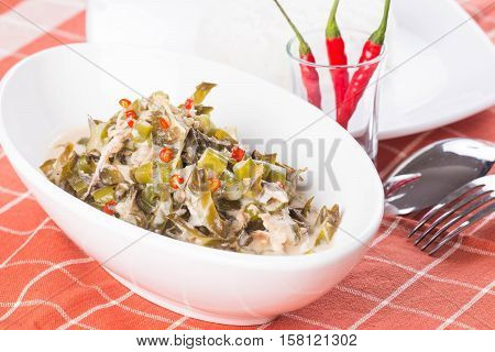 chopped legumes and winged beans in bagoong sauce