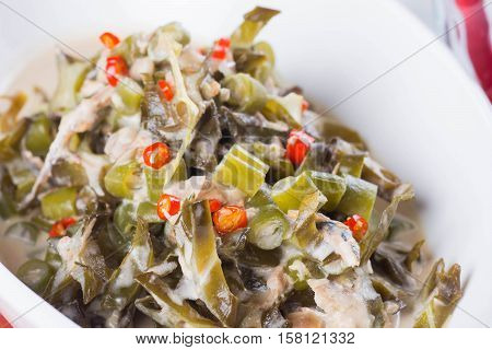 chopped legumes and winged beans in bagoong sauce