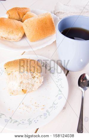 hot pandesal with garlic basil butter and hot coffee
