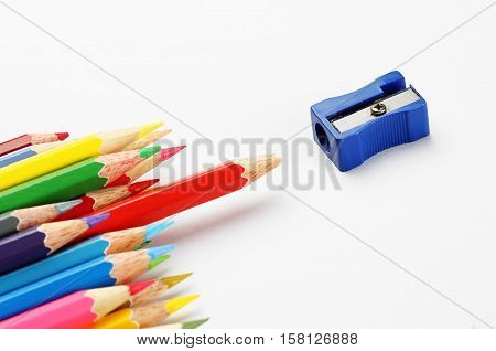 The sharpener pencil and color pencils group that the one blunt red pencil nearly sharpener. Conceptual Arts