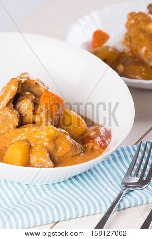 chicken with tomato sauce with carrots and potatoes also known as chicken caldereta