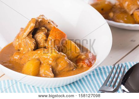 chicken with tomato sauce with carrots and potatoes also known as chicken caldereta