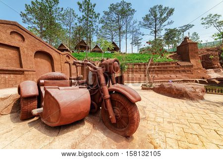 Big Clay Sculpture Of Motorcycle With Sidecar In Clay Town