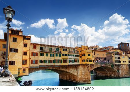 The Ponte Vecchio Over The Arno River In Florence, Italy