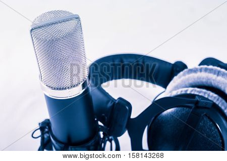 Microphone in a recording studio on a white background