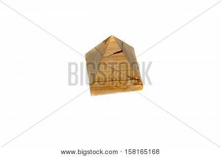 A pyramid of marble onyx isolated on white background. Pyramid made of natural onyx.