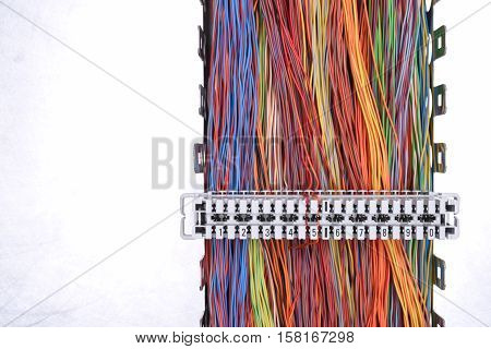 Telecommunication equipment cross panel with colorful cables
