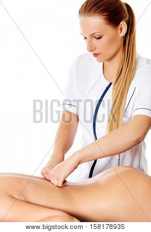 Woman having massage of body in the spa salon. Beauty treatment concept.