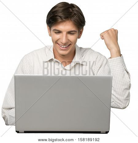 Portrait of Young Man Using Laptop with Fist Raised