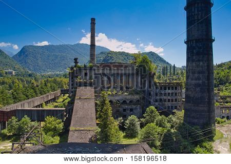 Abandoned, destroyed by war and overgrown Tkvarcheli power plant, Abkhazia, Georgia