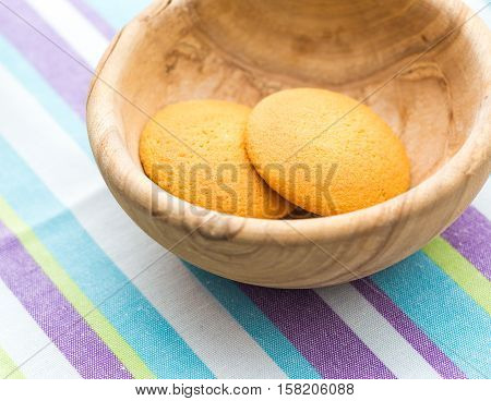 Biscuits Cakes In Wooden Bowl On Table
