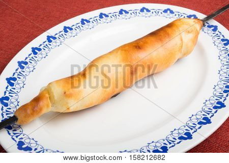 Freshly baked hachapuri with bacon and cheese