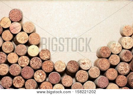 Wine corks on paper background for your text.