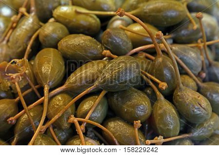 Green Pickled Big Capers Close Up Background