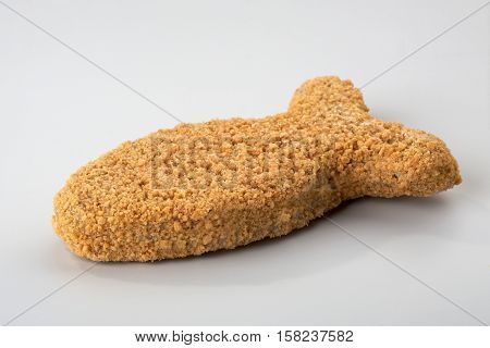 Frozen semi-finished cutlets in the shape of a fish