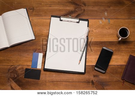 Post blog social media. View from above with copy space. Background for banner template layout mockup.Brown wooden office table, top view on workplace.